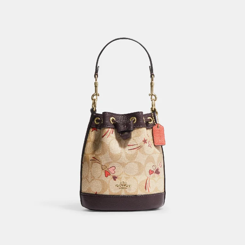 Coach Outlet Mini Dempsey Bucket Bag In Signature Canvas With Heart And Star Print